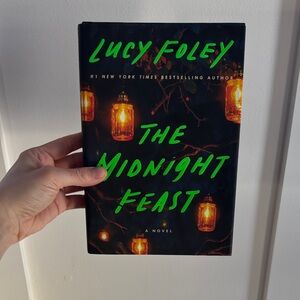 The Midnight Feast by - Black Cover Edition